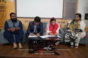 mage of President Engr. Umar Farooq Gul of YIC and CEO Ms. Afshan Khan of FastMove Packages signing the MOU, standing before a backdrop displaying both organizations' logos.